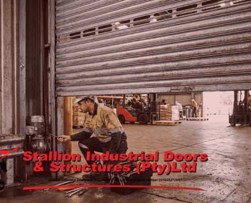 Industrial roller shutter maintenance and inspection on a heavy-duty warehouse shutter door in Gauteng.