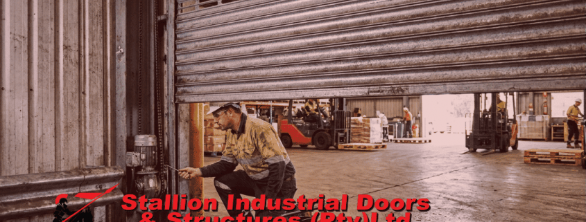 Industrial roller shutter maintenance and inspection on a heavy-duty warehouse shutter door in Gauteng.